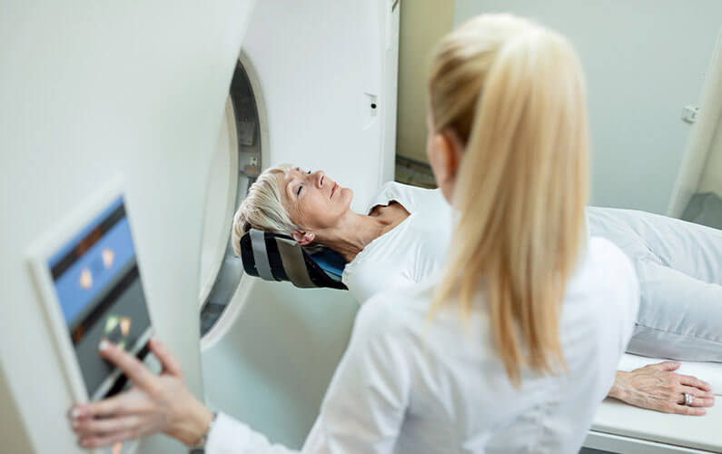 Woman getting an MRI scan
