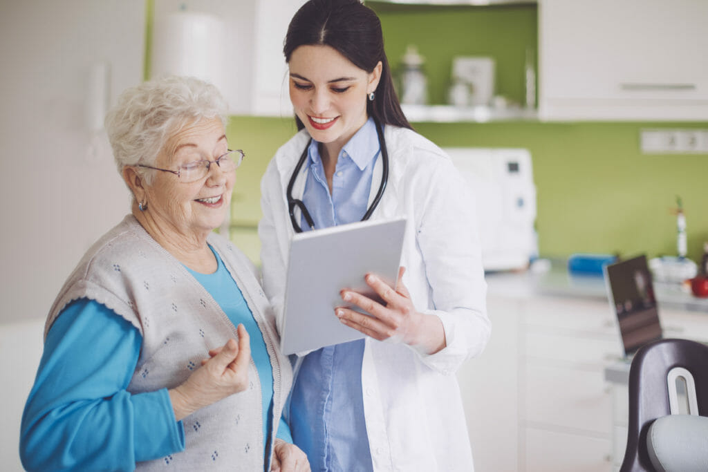 Doctor consulting her Senior patient