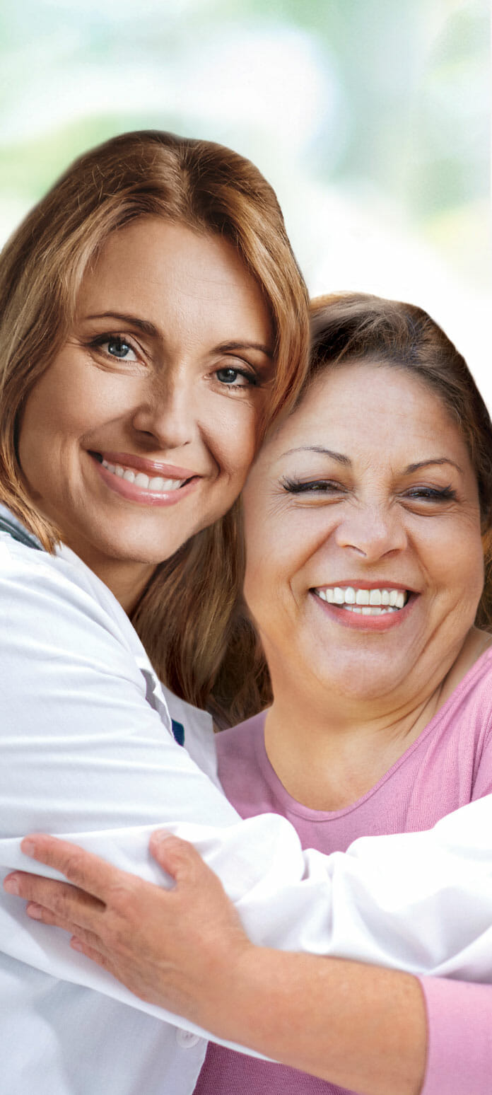 An Aetna affiliated doctor smiling with her patient.