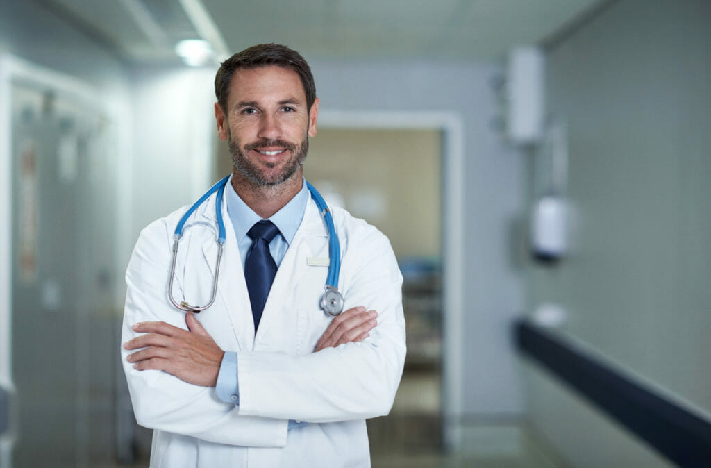 A medical provider in the photo with stethoscope hanging on the neck