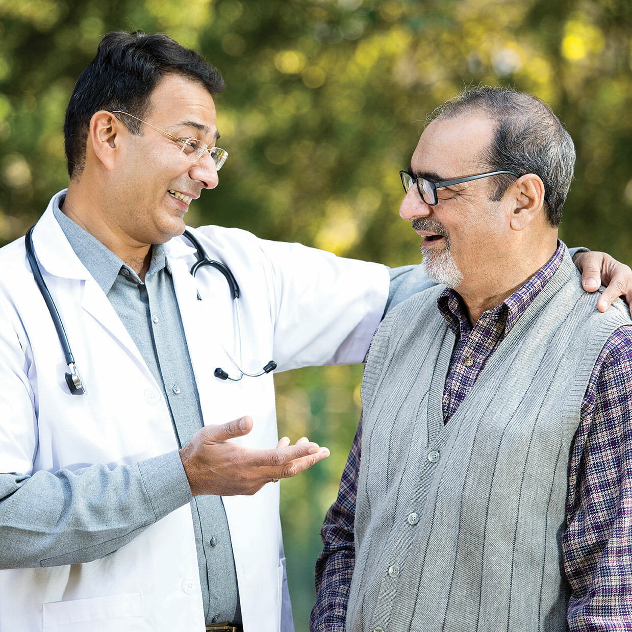 An Aetna affiliated doctor talking to his patient.