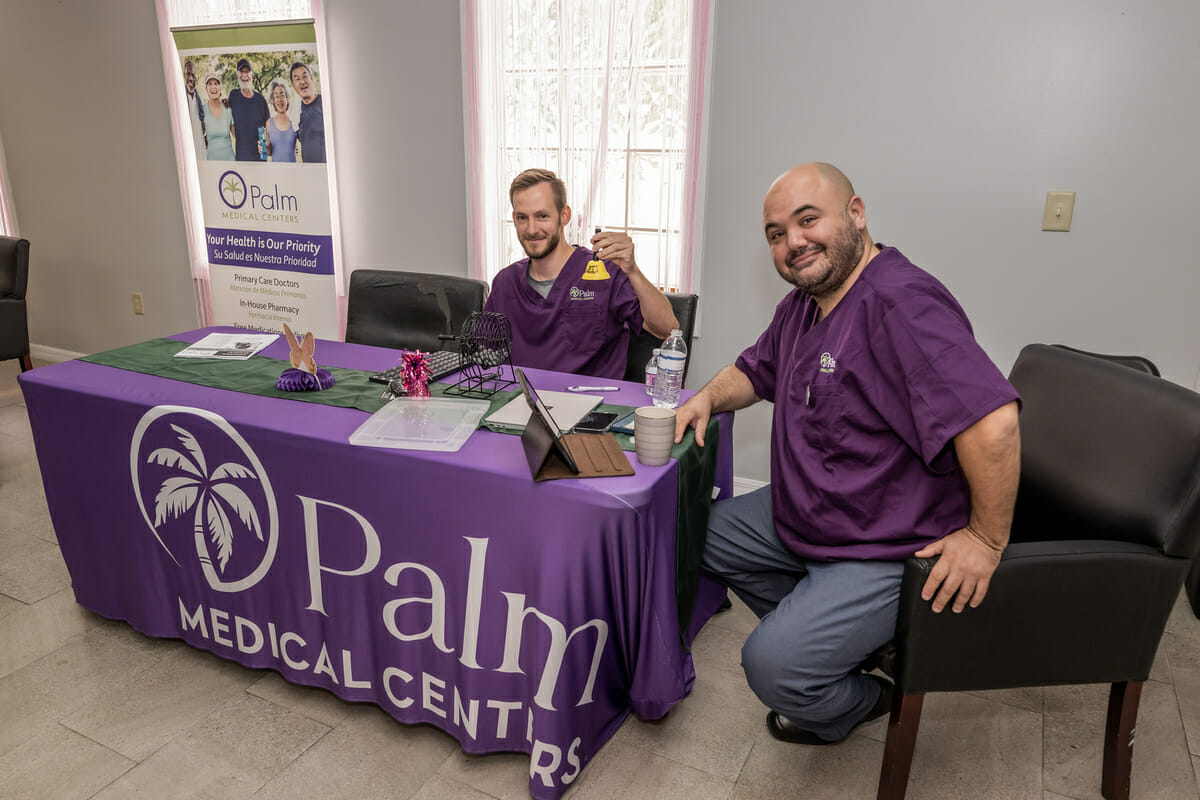 Palm Medical Centers providers at a table.