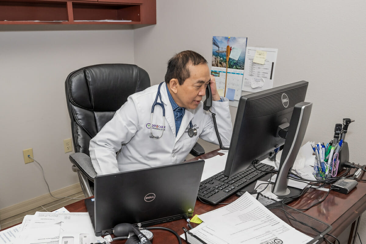 Doctor answering the phone.