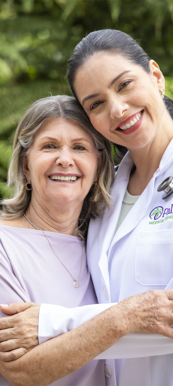 An older mother with her adult daughter.