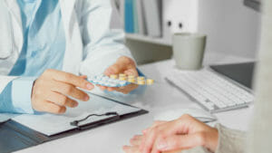 Close up of Young Asian woman doctors talking about medicine with the patient medical in health clinic. Medical health care concept.