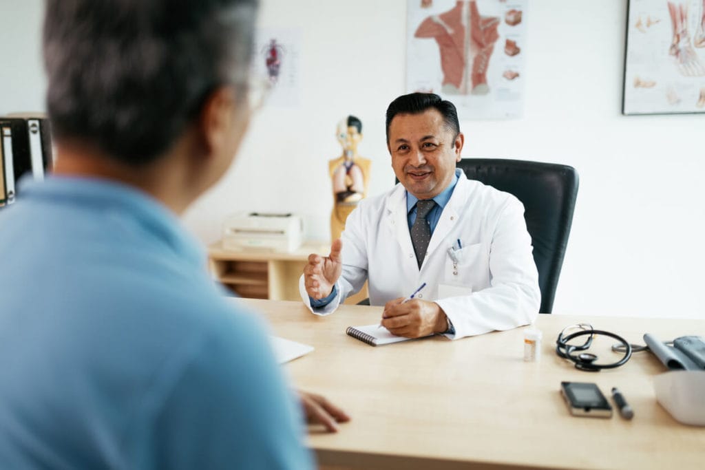 general care doctor having consultations with senior patient