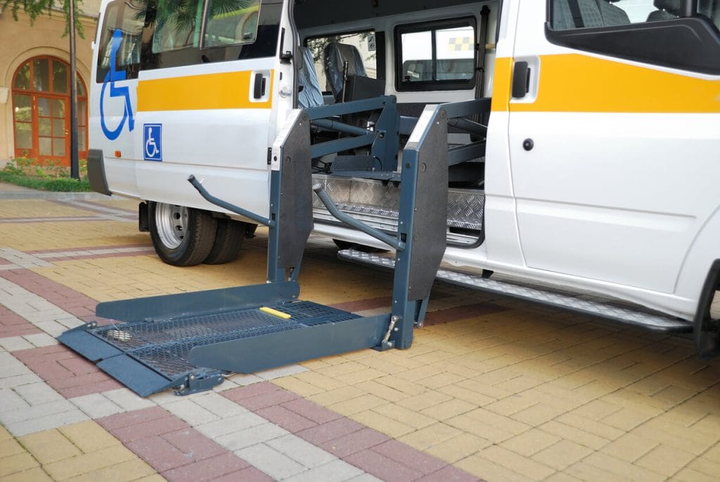 Image of a lift used for transporting a wheelchair in an ambulance for medical transportation services.