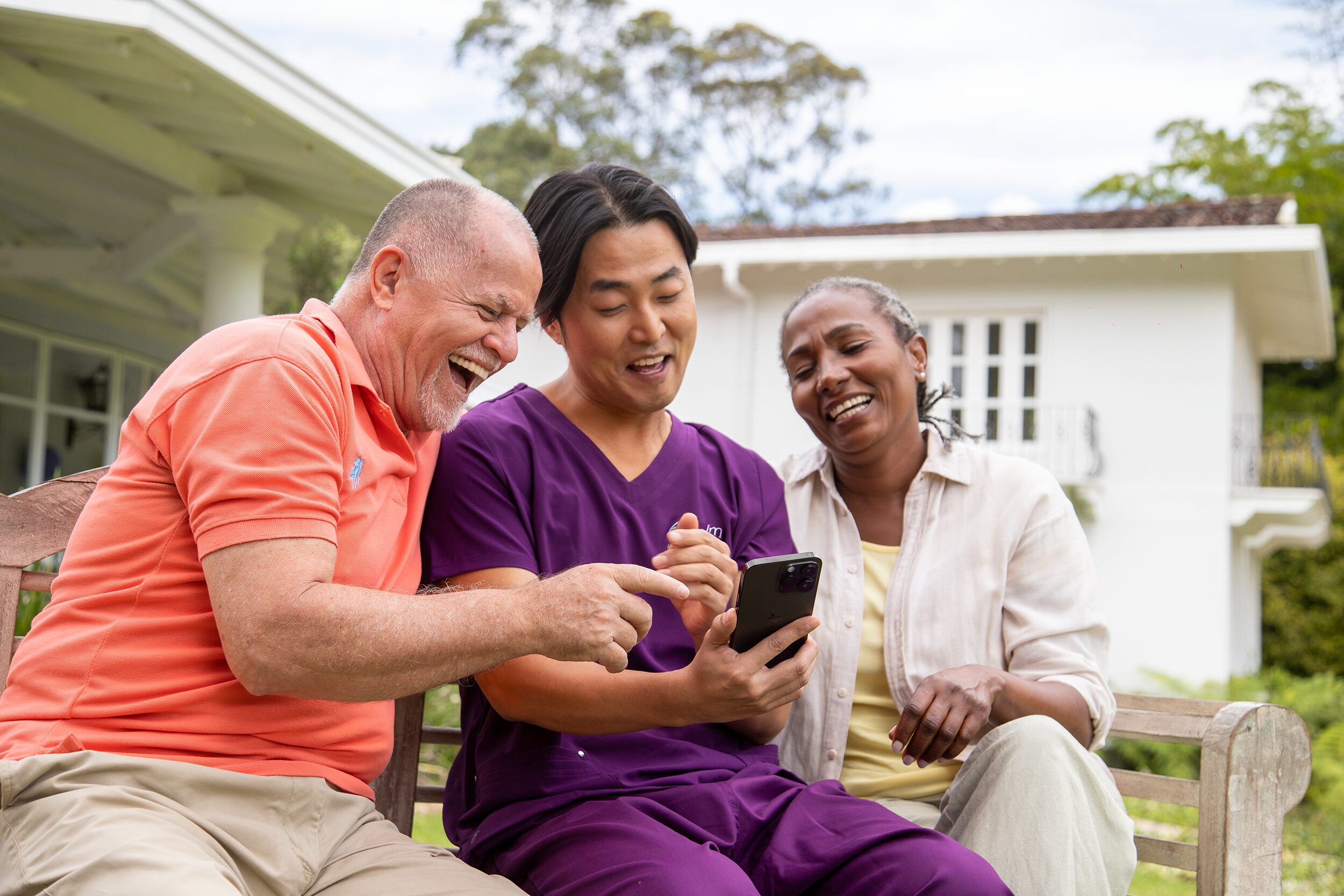 A doctor smiling with his patient.